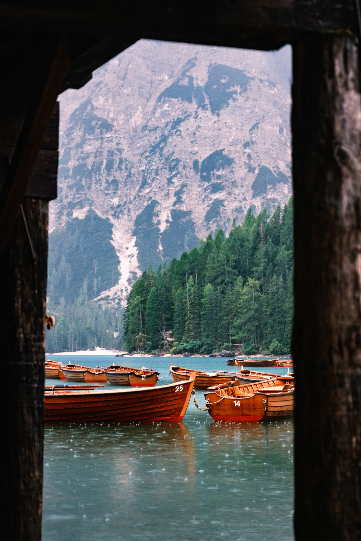 Wooden boats on an alpine lake